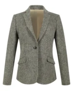 Front view of women's grey herringbone tweed blazer featuring elegant notch lapels and tailored styling. Back view of women's grey tweed blazer showing its structured feminine silhouette. Side view of women's grey herringbone blazer with classic hip-length proportions. Close-up of grey herringbone tweed fabric featuring its distinctive V-shaped woven pattern. Detail of women's grey tweed blazer showing the single-button closure, notch lapels, and traditional flap pockets.