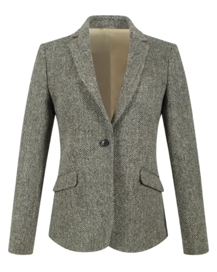 Front view of women's grey herringbone tweed blazer featuring elegant notch lapels and tailored styling. Back view of women's grey tweed blazer showing its structured feminine silhouette. Side view of women's grey herringbone blazer with classic hip-length proportions. Close-up of grey herringbone tweed fabric featuring its distinctive V-shaped woven pattern. Detail of women's grey tweed blazer showing the single-button closure, notch lapels, and traditional flap pockets.